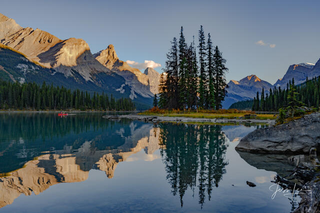A beautiful picture of Spirit Island Canoe in the Canadian Rockies is for sale as a fine art photography  print.