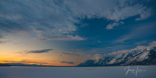 Winter sunrise across Jackson Lake in Grand Teton National Park.