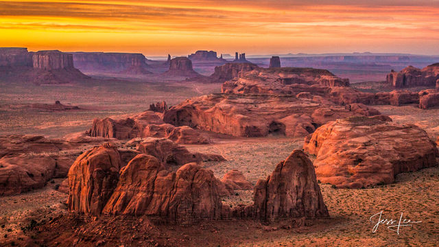 Hunts Mesa glowing during golden hour. 