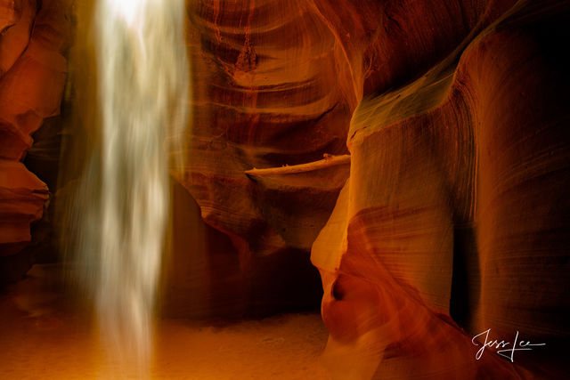 Light streaming through a hole in Slot Canyon, Arizona. 