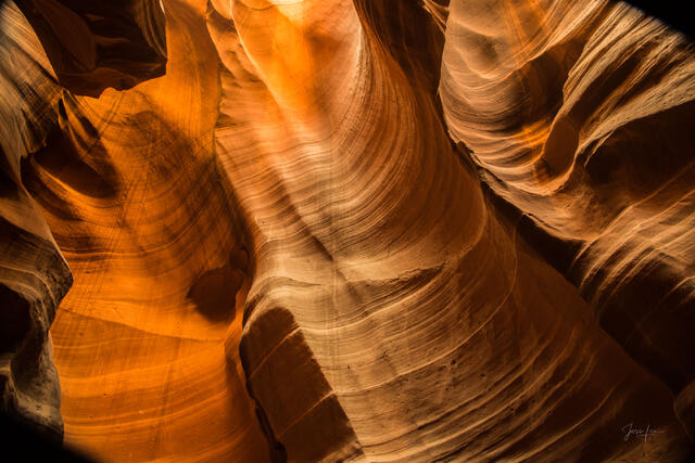 Light Shaft, Antelope Canyon - sunbeam illuminating swirling sandstone walls in an Arizona slot canyon
