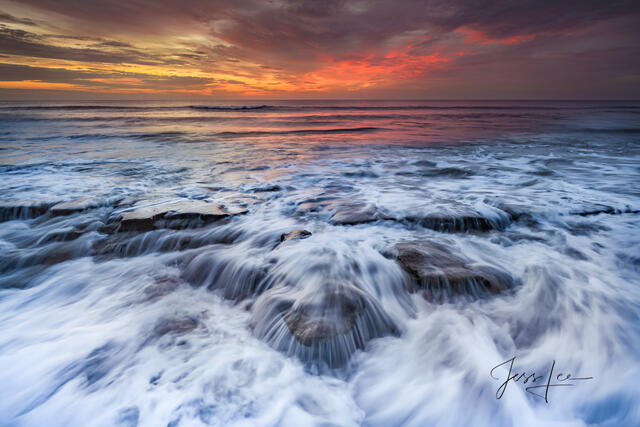 Sun rise surf and rocks