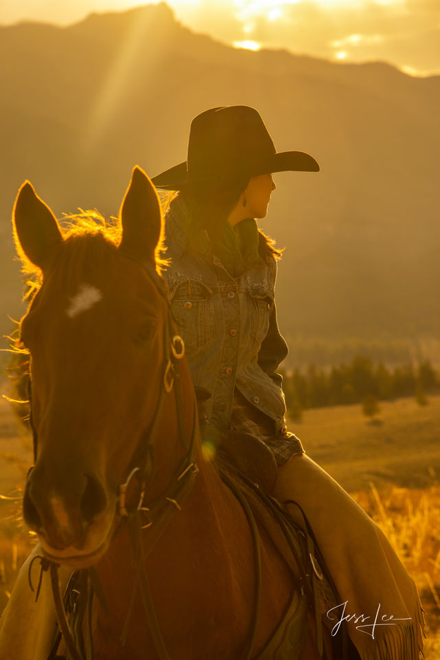Wyoming Cowgirl looking back into the autumn afternoon. print