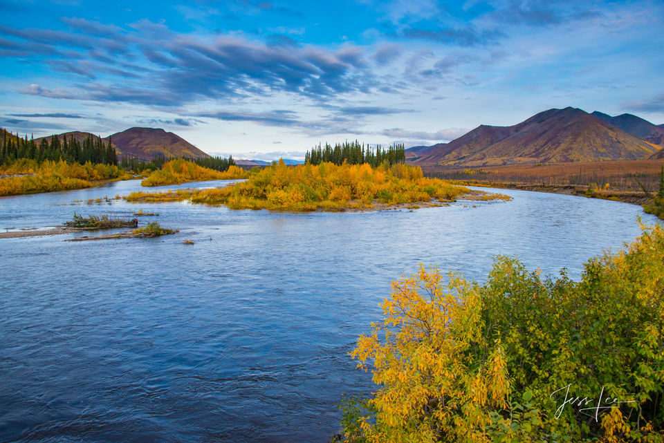 Northern Arctic river stretching into the mountain side. 