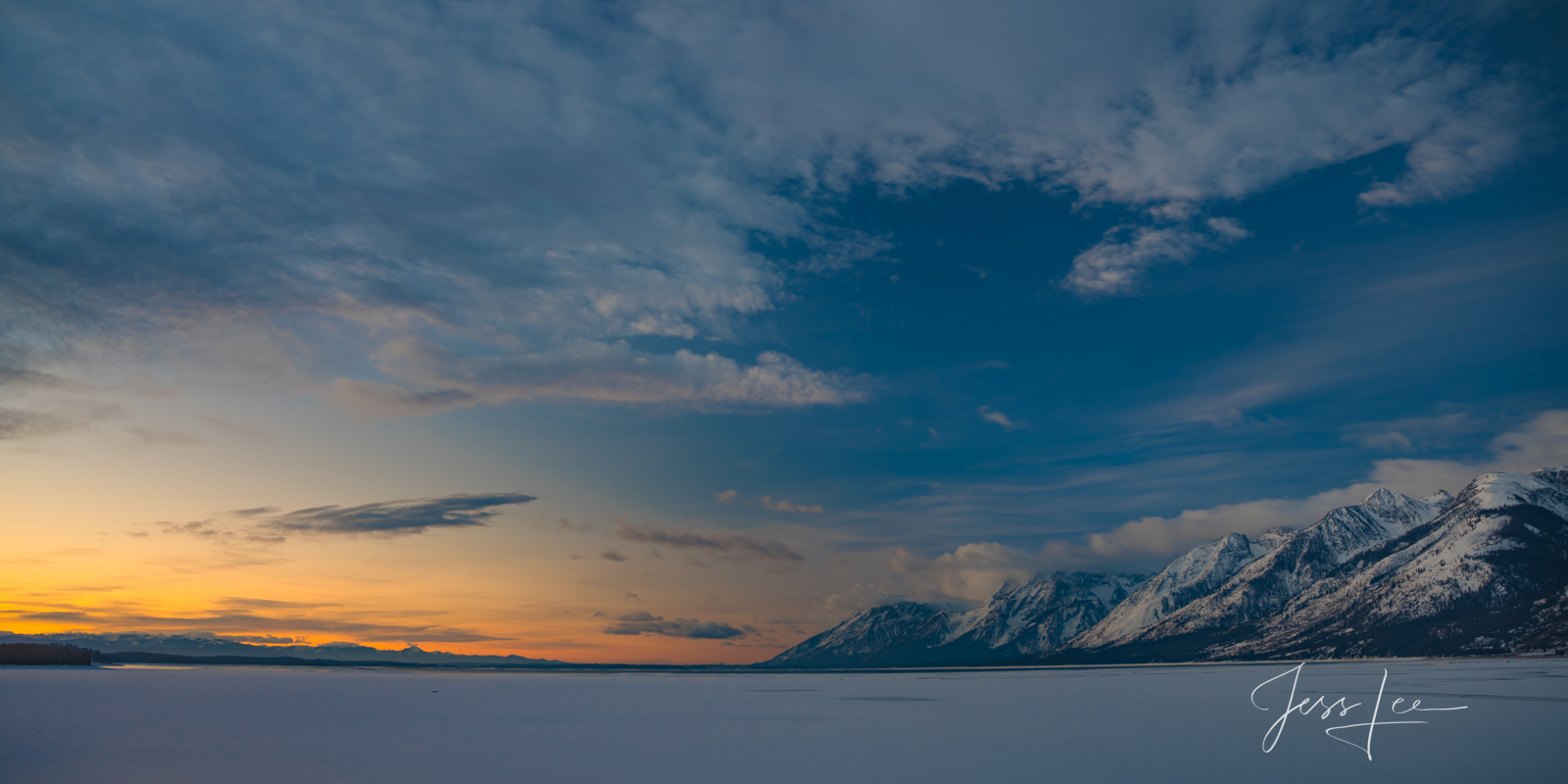 Winter sunrise across Jackson Lake in Grand Teton National Park.