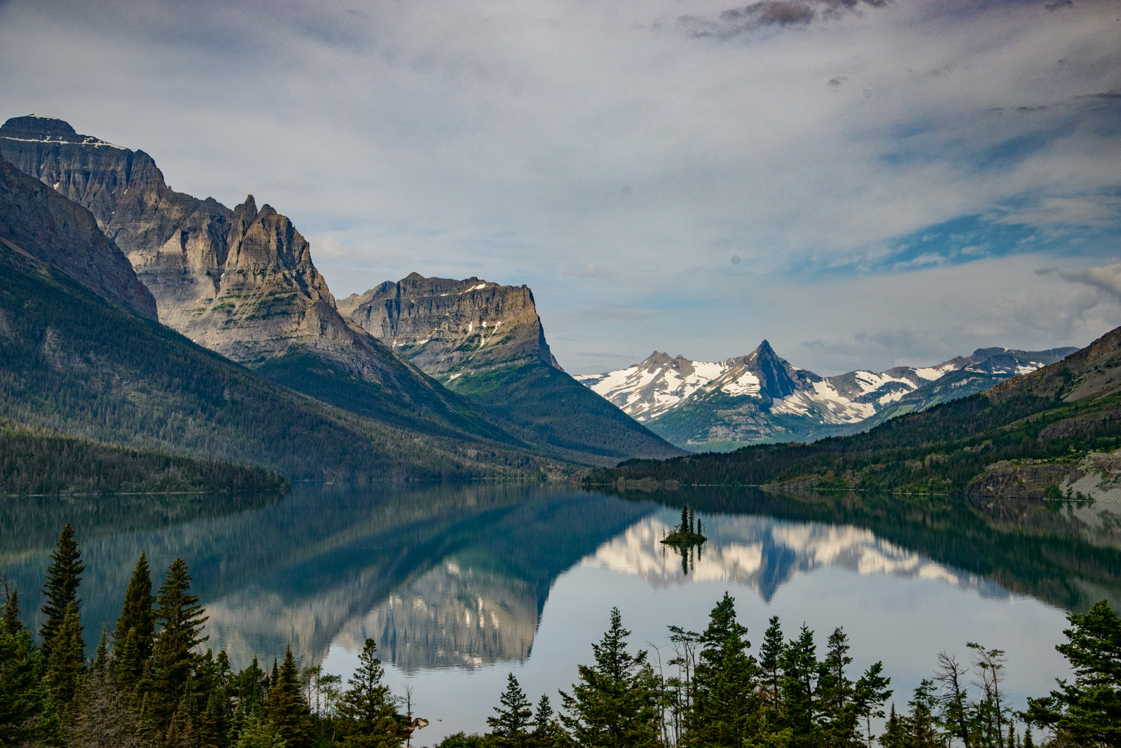 Goose Island Reflection a picture of Glacier National Park. A fine Art Limited Edition Print of sunset at Glacier. Order yours...