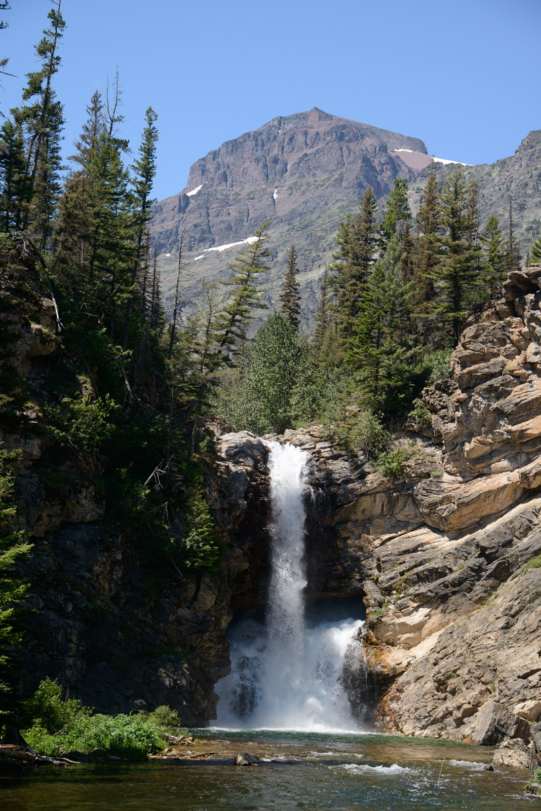 Double Falls in Glacier National Park. A fine Art Limited Edition Print of sunset at Glacier. Order yours today and enjoy the...
