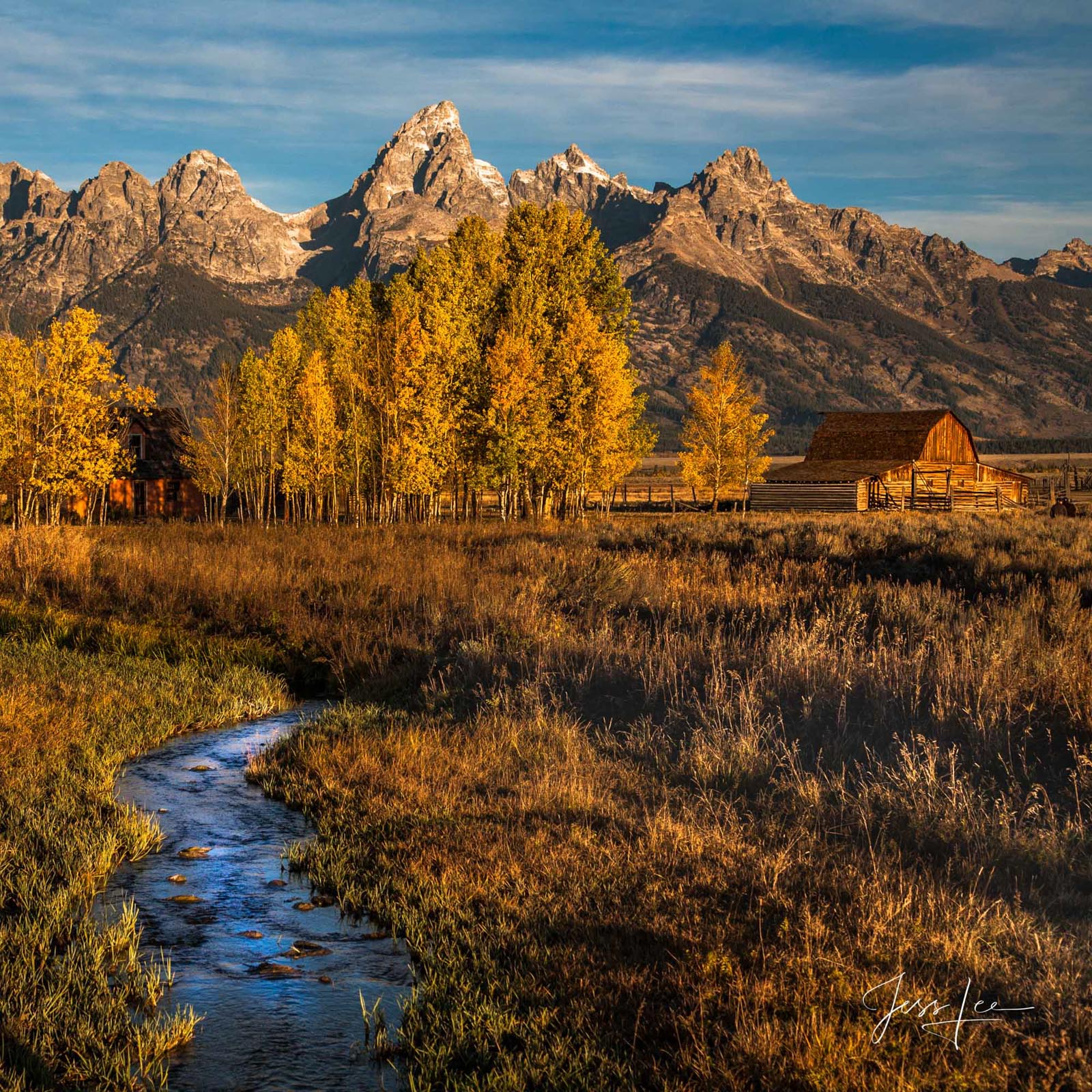 Teton barns photo with mountains.