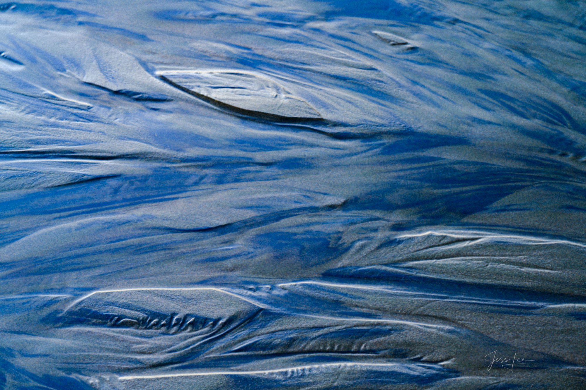 Blue Patterns in the sand.