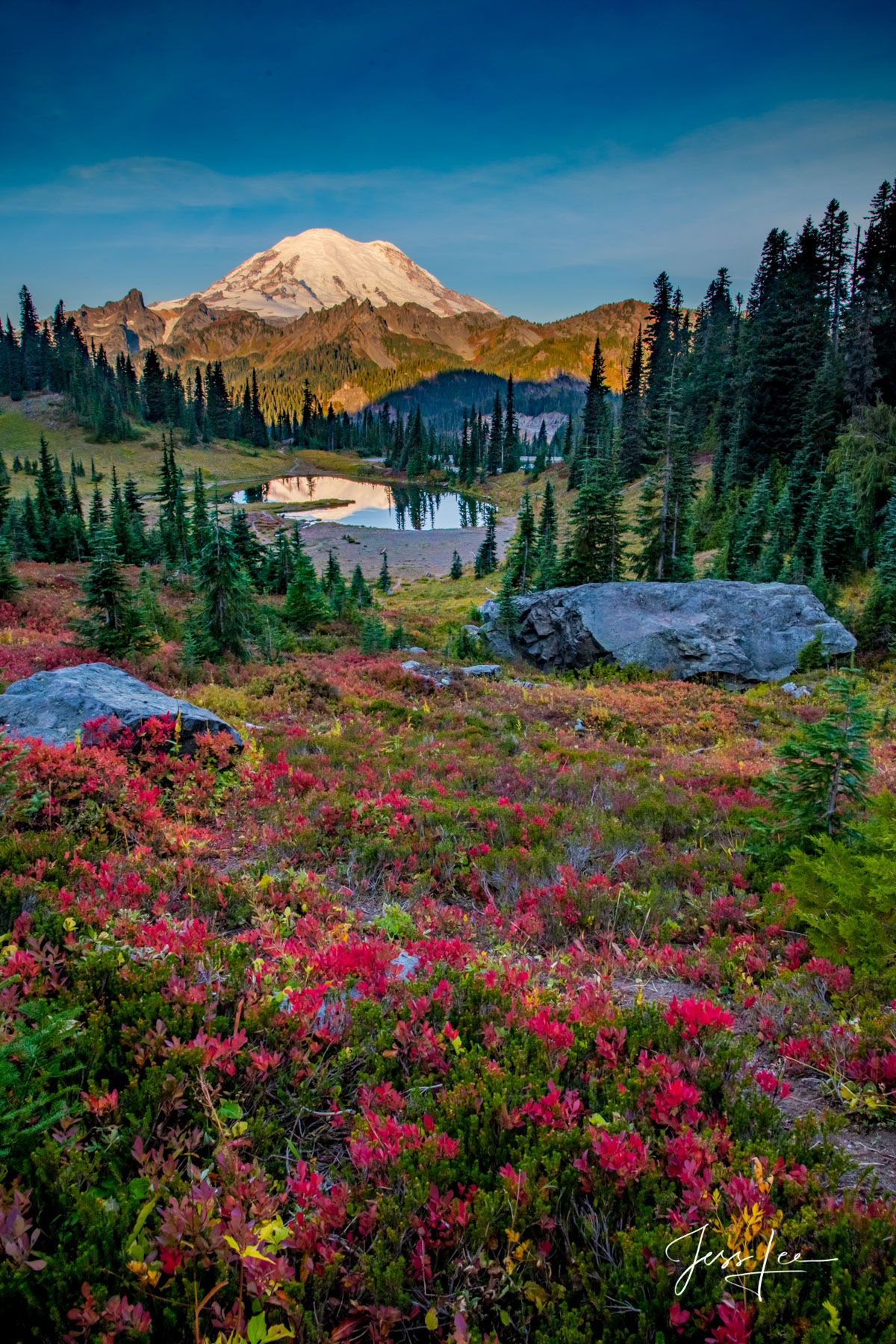 Photo of mount rainier reflecting in Tipso lake.