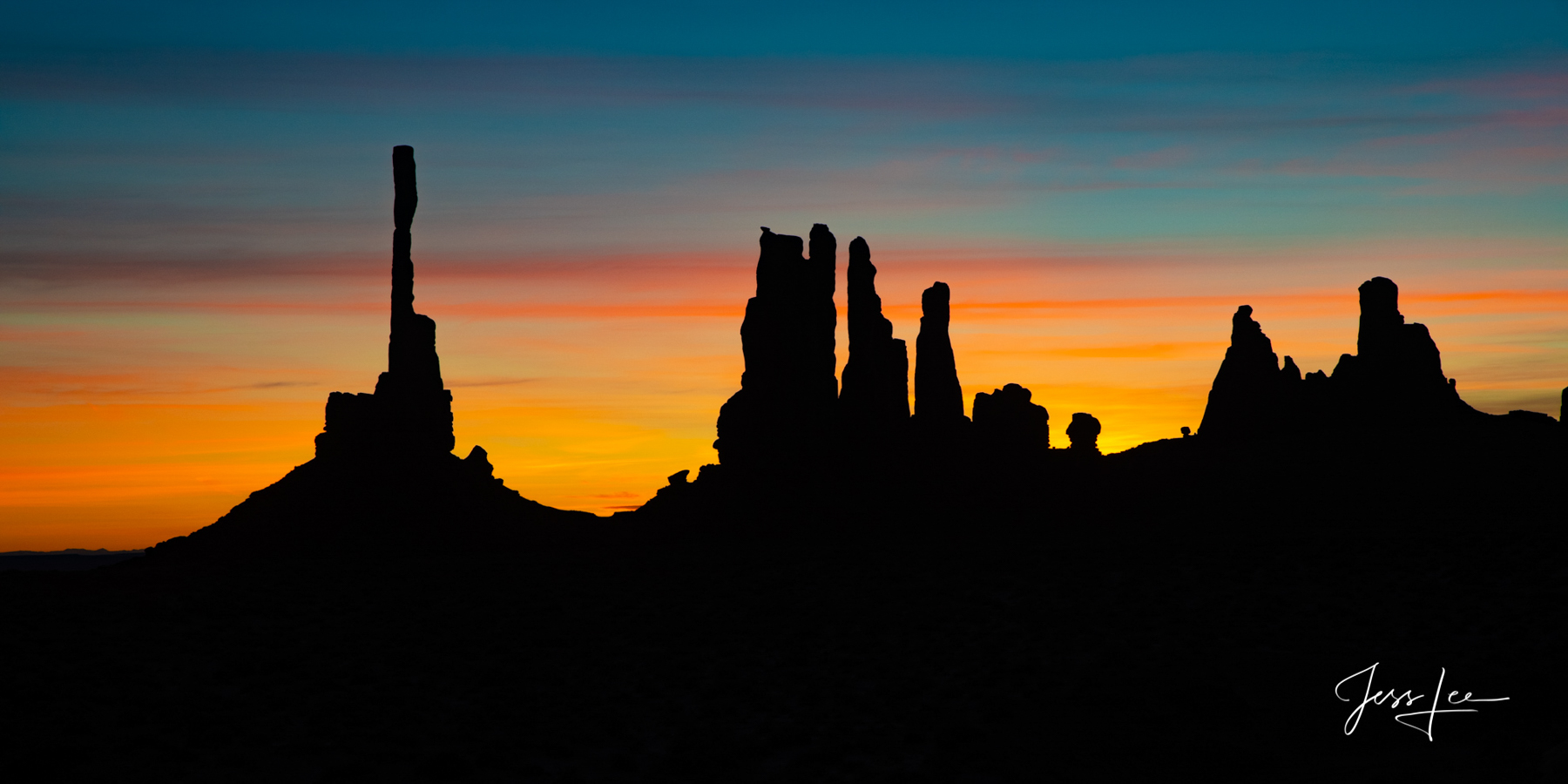 Sunrise set against Totem Rocks in Arizona 