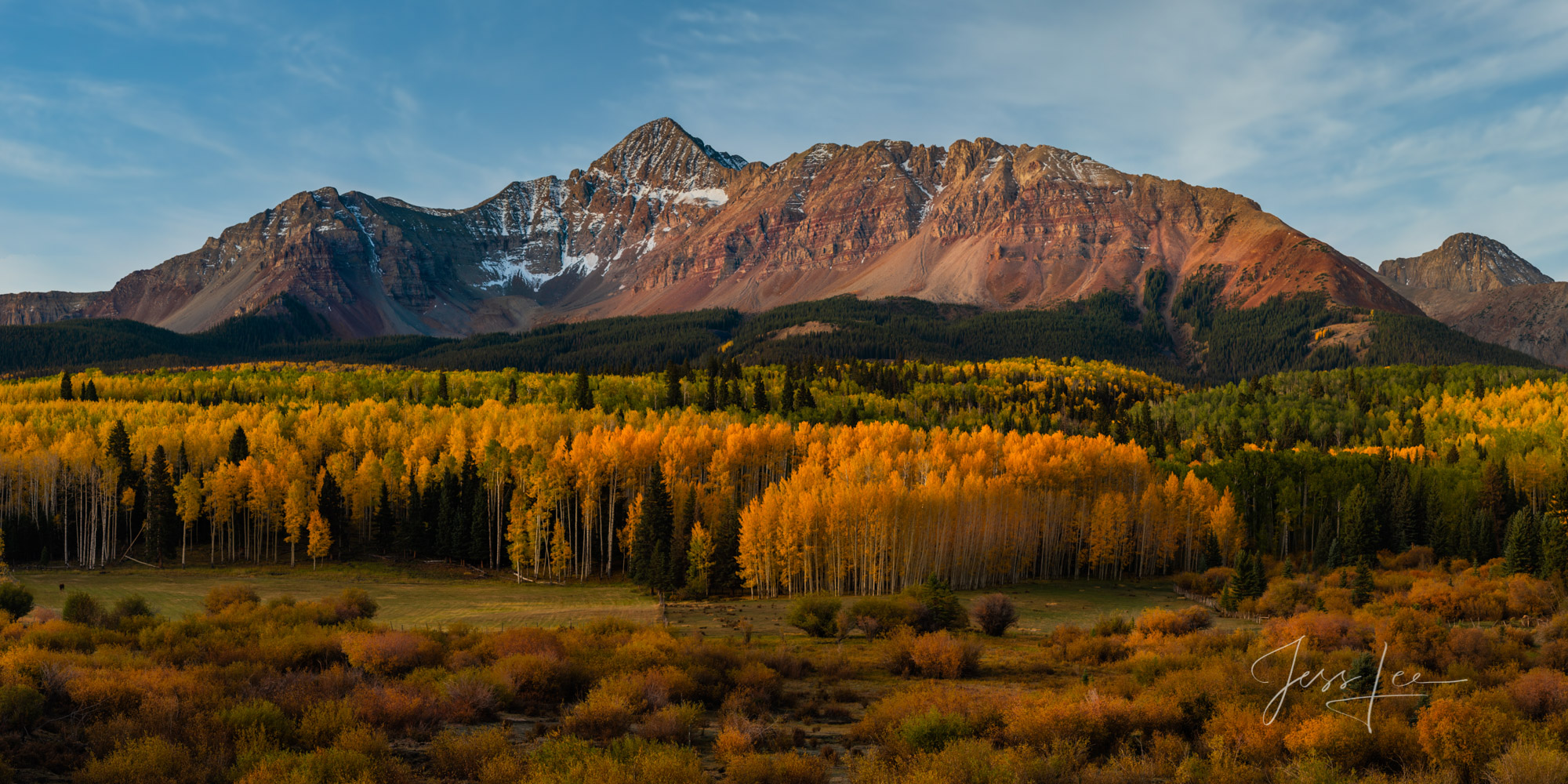 A Colorado Fall Color Photography Print of Mount Wilson at sunrise during the peak of Autumn Color in southwest Colorado. A limited...