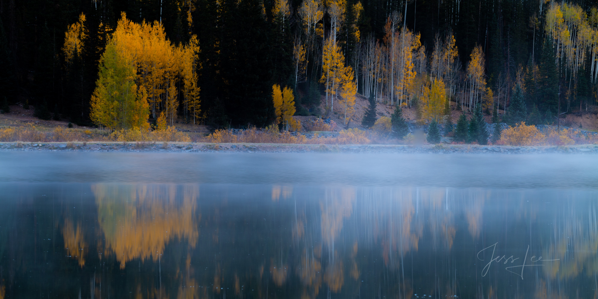 A Colorado Fall Color Print of Crystal Lake reflection at sunrise during the peak of Autumn Color in southeast Colorado. A limited...