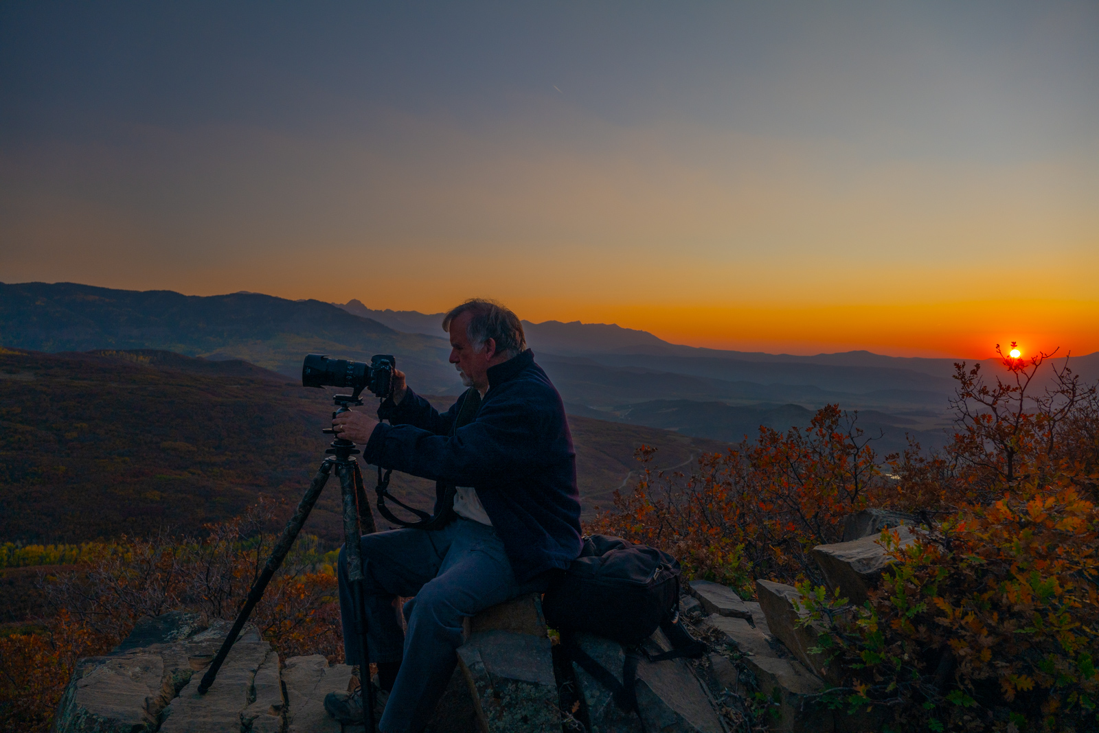 Photographer at sunset