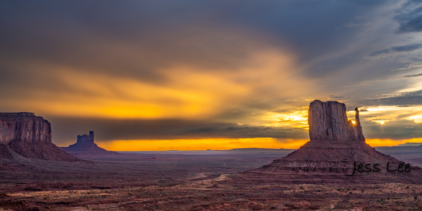 Monument Valley storm at sunrise in a beautiful fine art photography print.