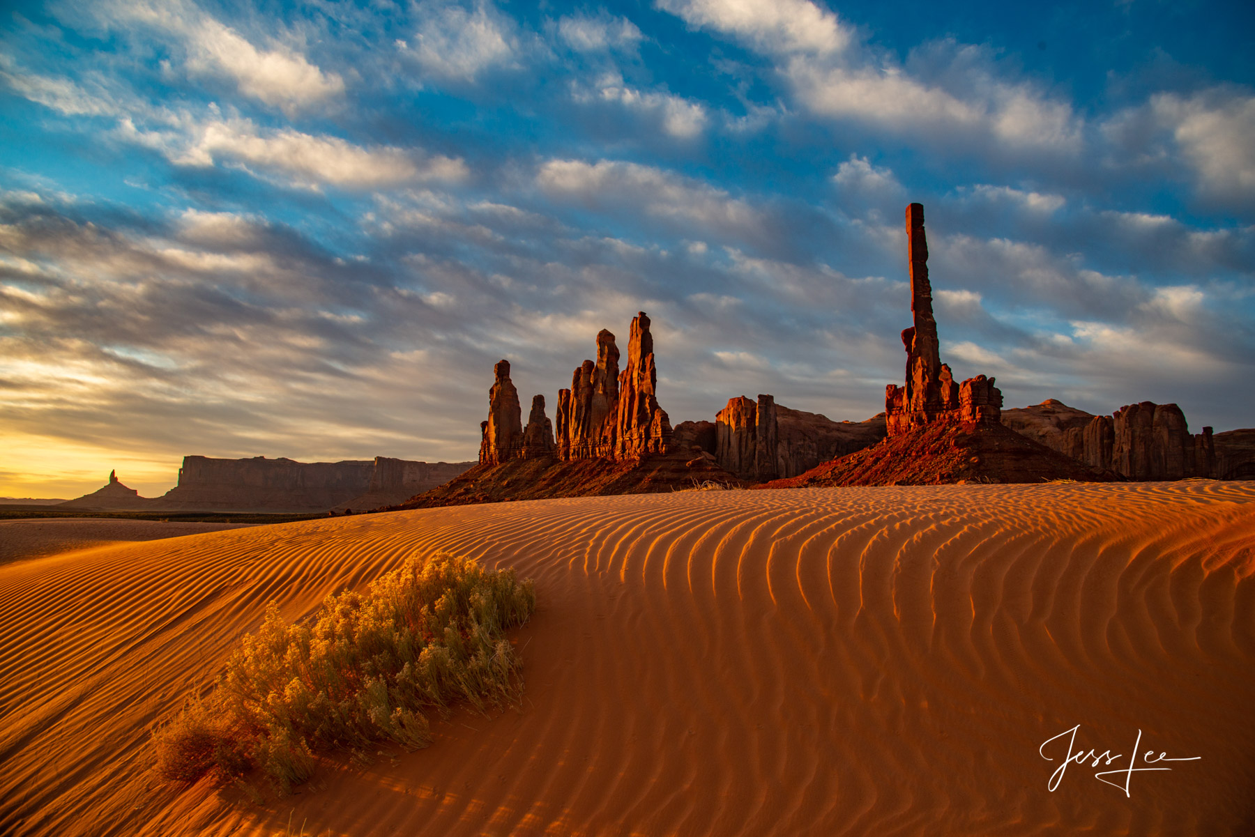 Ripples in the sand leading up to the totems in Monument Valley, Arizona. 