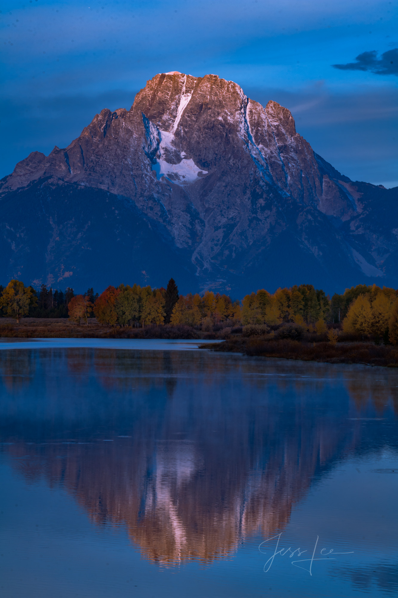 First Kiss | Sunrise on Moran Mountain Mount Moran reflecting in the Snake River Oxbow.